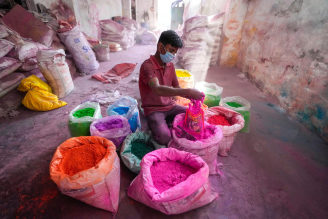 a-worker-packs-natural-color-powder-at-factory-ahead-of-hindu-festival-of-color-holi-in-ahmedabad-india-wednesday-march-1-2023-holi-festival-will-be-celebrated-on-march-8-ap-photoajit-solanki