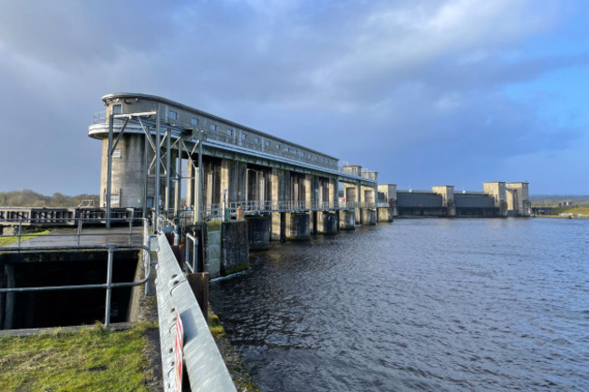 Parteen Weir - large concrete structure - standing within and above the River Shannon. 