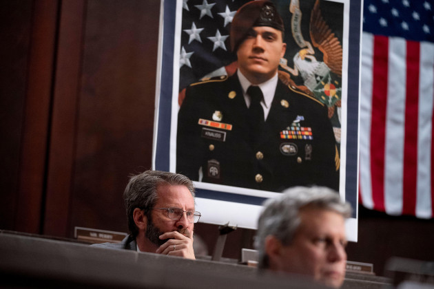 an-image-of-army-staff-sgt-ryan-c-knauss-one-of-the-members-of-the-military-killed-during-the-withdrawal-of-afghanistan-is-displayed-behind-rep-tim-burchett-r-tenn-left-as-he-speaks-during-a