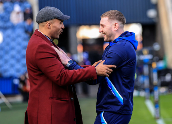 former-racing-92-teammates-simon-zebo-and-finn-russell-share-a-joke-before-the-game