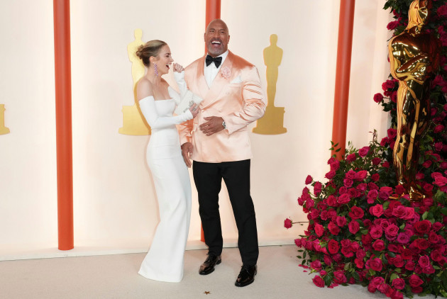 emily-blunt-left-and-dwayne-johnson-arrive-at-the-oscars-on-sunday-march-12-2023-at-the-dolby-theatre-in-los-angeles-photo-by-jordan-straussinvisionap