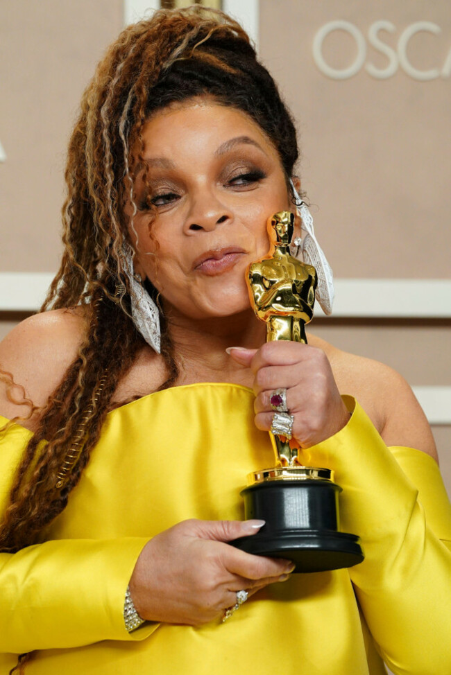 ruth-e-carter-poses-with-the-award-for-best-costume-design-for-black-panther-wakanda-forever-in-the-press-room-at-the-oscars-on-sunday-march-12-2023-at-the-dolby-theatre-in-los-angeles-photo