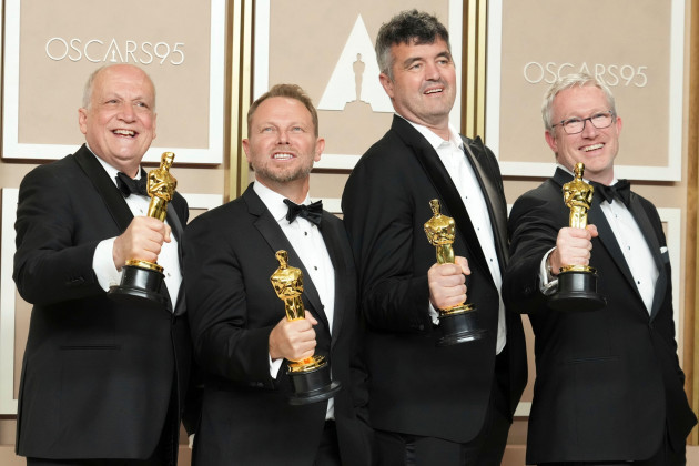 joe-letteri-from-left-richard-baneham-eric-saindon-and-daniel-barrett-winners-of-the-award-for-best-visual-effects-for-avatar-the-way-of-water-pose-in-the-press-room-at-the-oscars-on-sunday-ma