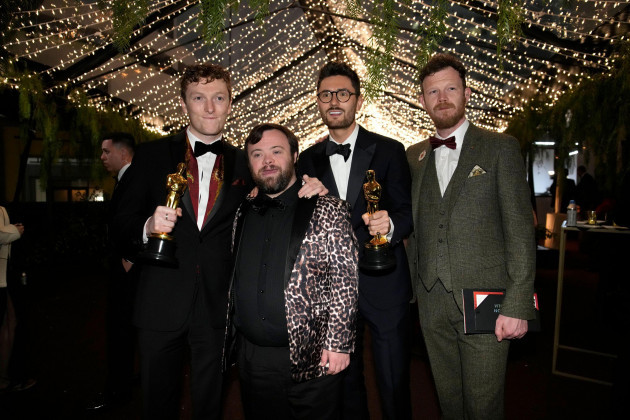 ross-white-from-left-and-tom-berkeley-winners-of-the-award-for-best-live-action-short-for-an-irish-goodbye-attend-the-governors-ball-with-cast-members-james-martin-second-from-left-and-seamus