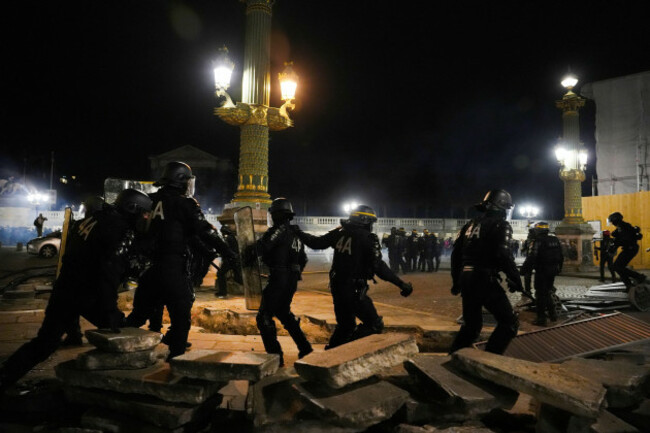 police-officers-clear-the-concorde-square-after-a-demonstration-near-the-national-assembly-in-paris-thursday-march-16-2023-french-president-emmanuel-macron-has-shunned-parliament-and-imposed-a-hig