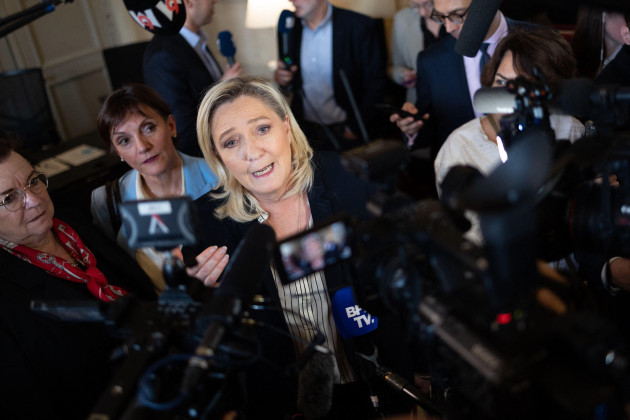french-deputy-and-president-of-le-rassemblement-national-rn-far-right-parliamentary-group-marine-le-pen-speaks-to-the-press-at-the-4-colonnes-after-a-session-when-french-prime-minister-confirmed-to-fo