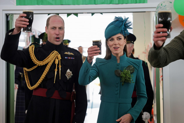 the-prince-and-princess-of-wales-take-part-in-the-senior-guardsmans-toast-and-enjoy-a-glass-of-guinness-during-a-visit-to-the-1st-battalion-irish-guards-for-the-st-patricks-day-parade-at-mons-barra