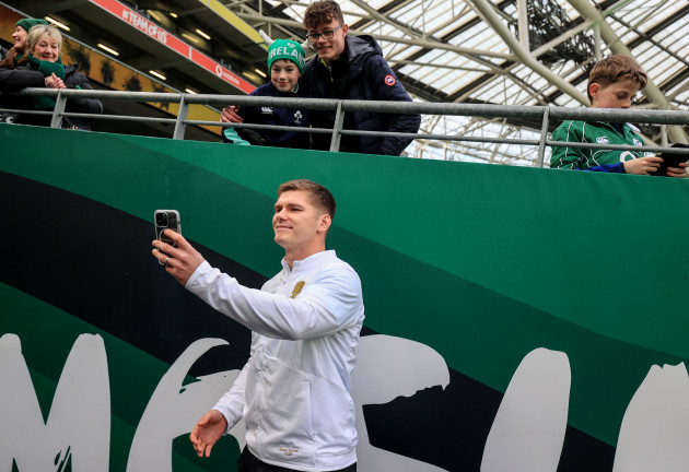 owen-farrell-takes-a-picture-with-fans-before-the-game