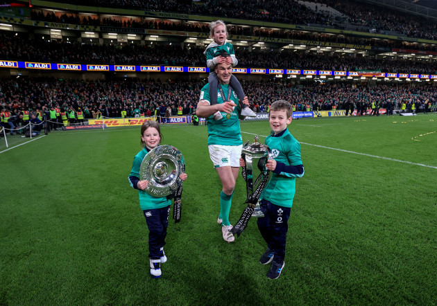 ohnny-sexton-celebrates-winning-with-his-children-luca-sophie-and-amy-and-the-guinness-six-nations-and-triple-crown-trophies