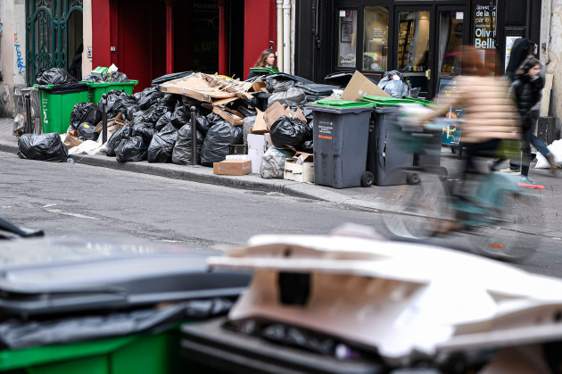 full-bins-on-march-15-2023-in-paris-france-a-strike-by-waste-collectors-in-france-has-led-to-rubbish-trash-piling-up-in-the-streets-of-paris-leaving-locals-and-tourists-to-the-french-capital-dea