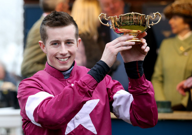 bryan-cooper-is-presented-with-the-timico-cheltenham-gold-cup-chase-after-winning-with-don-cossack