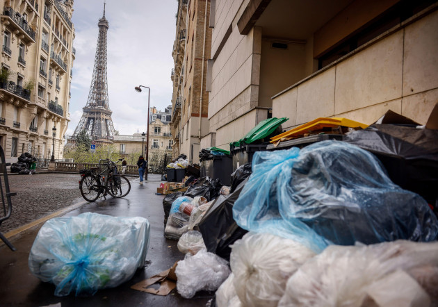 uncollected-garbage-pile-is-on-a-street-near-eiffel-tower-in-paris-friday-march-24-2023-french-president-macrons-office-says-state-visit-by-britains-king-charles-iii-is-postponed-amid-mass-strik
