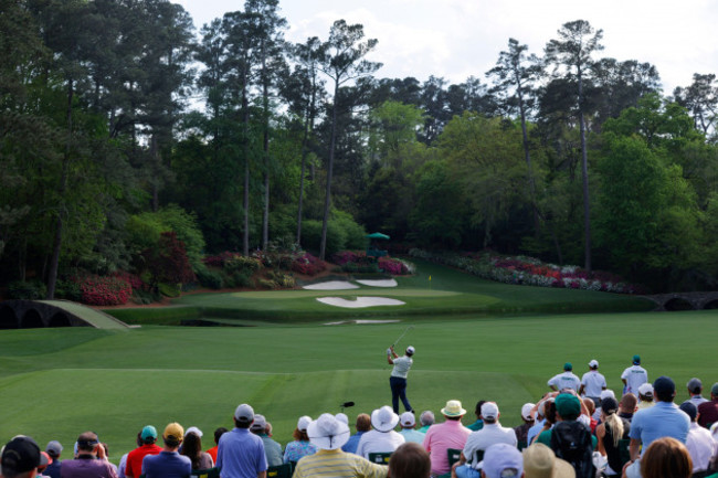 golf-the-masters-augusta-national-golf-club-augusta-georgia-u-s-april-11-2021-japans-hideki-matsuyama-hits-his-tee-shot-on-the-12th-hole-during-the-final-round-reutersbrian-snyder