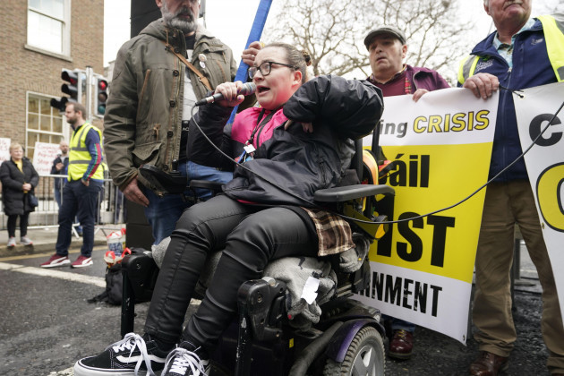 disability-campaigner-kayleigh-mckevitt-speaking-to-the-crowd-taking-part-in-a-cost-of-living-demonstration-outside-dail-eireann-dublin-picture-date-saturday-april-1-2023