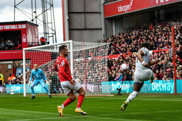 the-city-ground-nottingham-uk-1st-apr-2023-premier-league-football-nottingham-forest-versus-wolverhampton-wanderers-adama-traore-of-wolves-crosses-past-harry-toffolo-of-forest-credit-action-pl