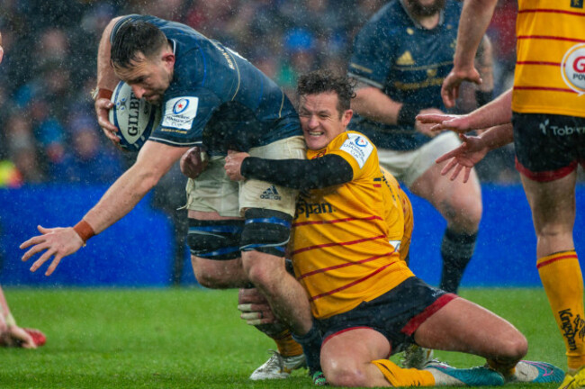 dublin-ireland-01st-apr-2023-jack-conan-of-leinster-tackled-by-billy-burns-of-ulster-during-the-heineken-champions-cup-round-of-16-match-between-leinster-rugby-and-ulster-rugby-at-aviva-stadium