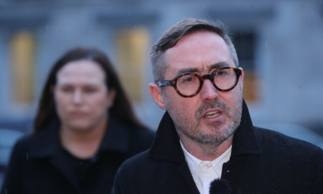 sinn-fin-politicians-eoin-broin-right-speaks-to-the-media-as-louise-oreilly-left-looks-on-at-the-plinth-at-leinster-house-dublin-regarding-the-tanaiste-leo-varadkars-decision-to-leak-co