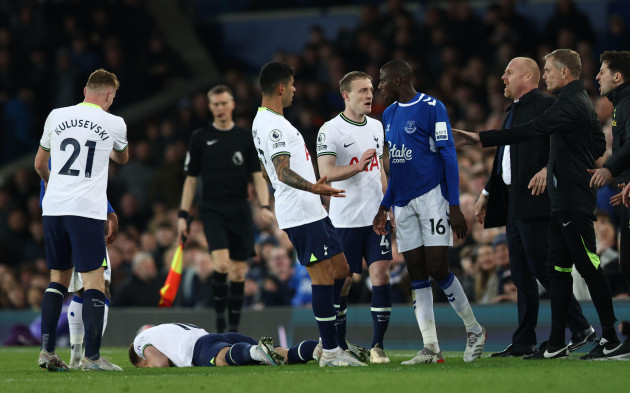 liverpool-uk-3rd-apr-2023-cristian-romero-of-tottenham-confronts-abdoulaye-doucoure-of-everton-following-his-clash-with-harry-kane-of-tottenham-during-the-premier-league-match-at-goodison-park-li