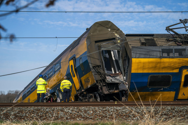 voorschoten-netherlands-04032023-emergency-services-at-work-at-a-derailed-night-train-the-passenger-train-collided-with-construction-equipment-on-the-track-one-person-died-and-several-people-we