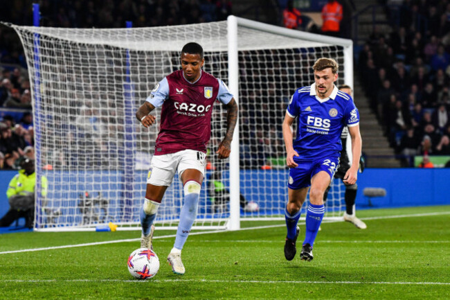 king-power-stadium-leicester-uk-4th-apr-2023-premier-league-football-leicester-city-versus-aston-villa-ashley-young-of-aston-villa-shields-the-ball-from-kiernan-dewsbury-hall-of-leicester-credi