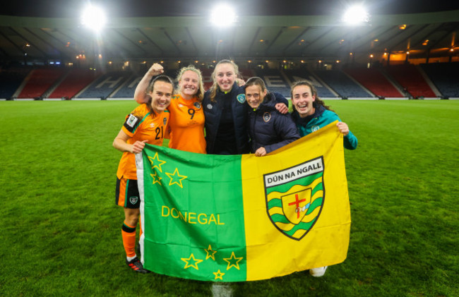 ciara-grant-amber-barrett-niamh-mcdaid-and-roma-mclaughlin-celebrate-after-the-game-with-a-co-donegal-flag