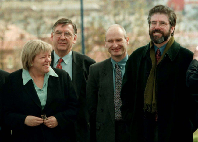 northern-ireland-secretary-of-state-mo-mowlem-l-goes-on-a-west-belfast-walkabout-april-16-with-political-opposites-sinn-fein-president-gerry-adams-r-and-billy-hutchinson-2ndr-from-the-progressi