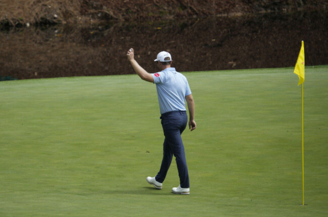 augusta-united-states-05th-apr-2023-seamus-power-of-ireland-waves-after-retrieving-his-ball-after-sinking-a-hole-in-one-on-the-8th-hole-during-the-par-3-contest-at-the-masters-tournament-at-august