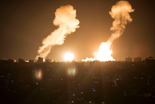 gaza-7th-apr-2023-fire-and-smoke-are-seen-following-an-israeli-airstrike-in-the-southern-gaza-strip-city-of-khan-younis-on-april-7-2023-israel-on-friday-intensified-airstrikes-on-military-posts-i