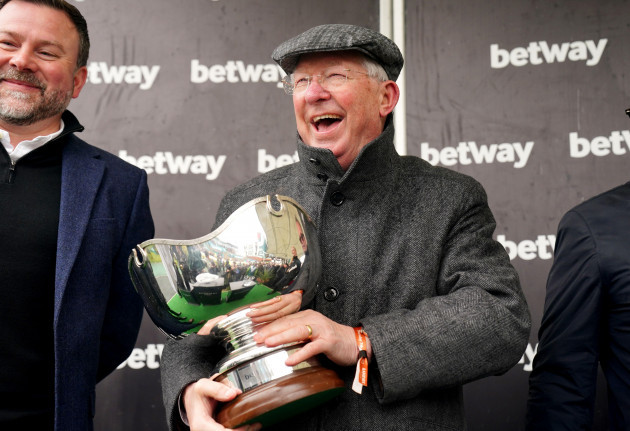 co-owner-sir-alex-ferguson-celebrates-with-the-betway-bowl-trophy-after-clan-des-obeaux-wins-the-betway-bowl-chase-at-aintree-racecourse-liverpool-picture-date-thursday-april-7-2022