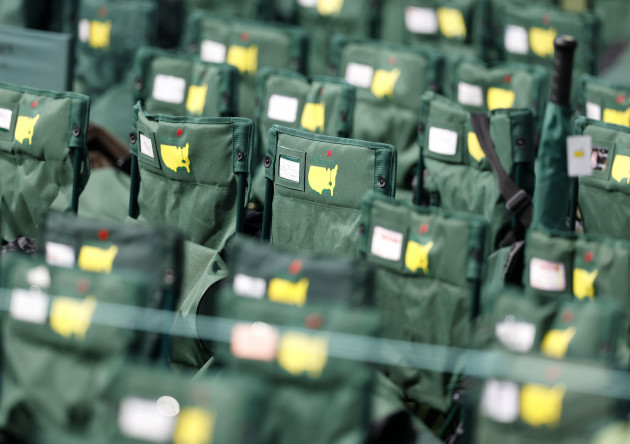 augusta-united-states-07th-apr-2023-official-masters-branded-green-chairs-for-patrons-to-sit-in-are-set-around-the-18th-green-during-the-second-round-at-the-masters-tournament-at-augusta-national