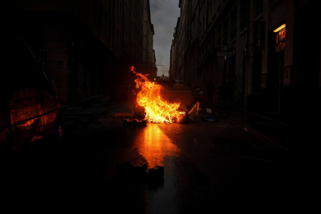 a-barricade-burns-during-a-protest-in-lyon-central-france-friday-april-14-2023-frances-constitutional-council-on-friday-approved-an-unpopular-plan-to-raise-the-retirement-age-from-62-to-64-in-a