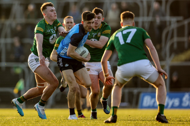 dan-oleary-is-tackled-by-ruairi-kinsella-and-brian-oreilly