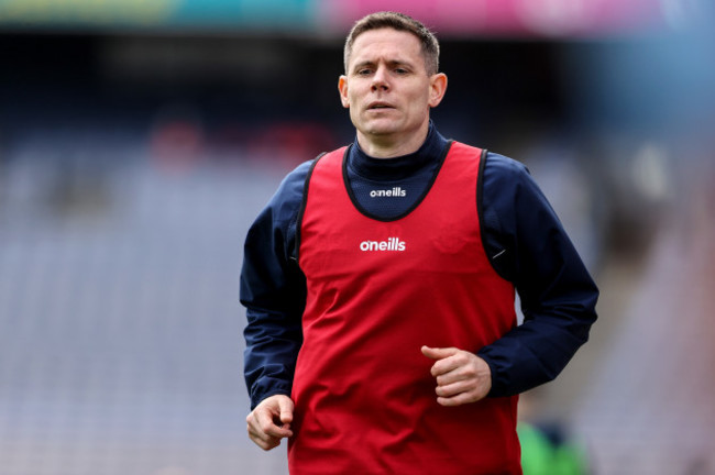 stephen-cluxton-warms-up-on-the-sideline