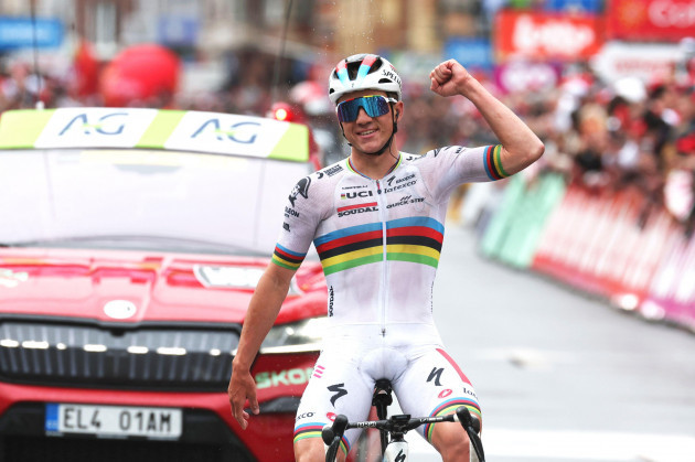 belgiums-remco-evenepoel-of-the-soudal-quick-step-team-crosses-the-finish-line-to-win-the-belgian-cycling-classic-and-uci-world-tour-race-liege-bastogne-liege-in-liege-belgium-sunday-april-23-20