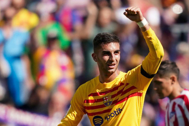 barcelonas-ferran-torres-celebrates-after-scoring-his-sides-opening-goal-during-a-spanish-la-liga-soccer-match-between-barcelona-and-atletico-madrid-at-the-camp-nou-stadium-in-barcelona-spain-sun