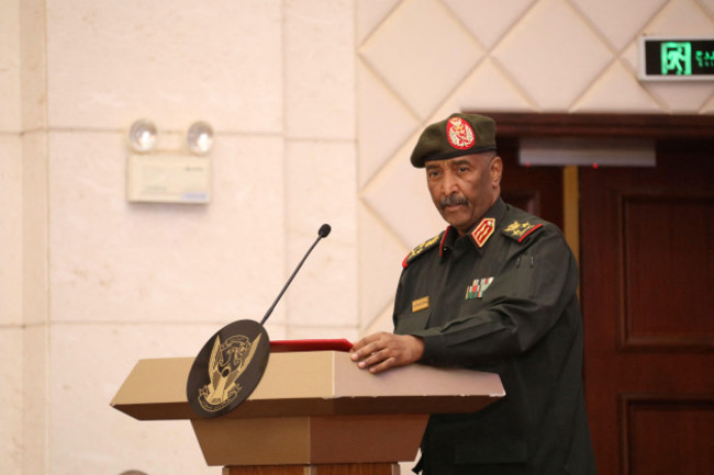 sudans-military-leader-general-abdel-fattah-al-burhan-stands-at-the-podium-during-a-ceremony-to-sign-the-framework-agreement-between-military-rulers-and-civilian-powers-in-khartoum-sudan-december-5