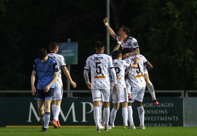 jonathan-afolabi-celebrates-scoring-a-goal-with-teammates