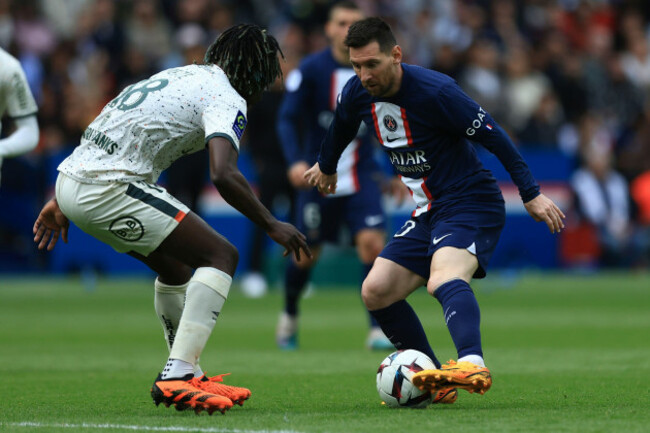 psgs-lionel-messi-right-face-lorients-bamo-meite-during-the-french-league-one-soccer-match-between-paris-saint-germain-and-lorient-at-the-parc-des-princes-stadium-in-paris-sunday-april-30-2023