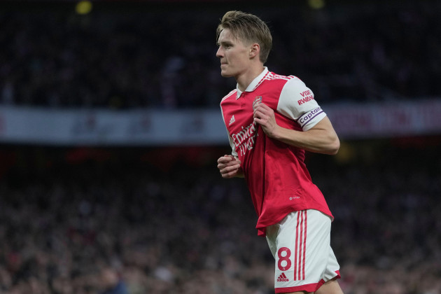 arsenals-martin-odegaard-celebrates-after-scoring-his-sides-opening-goal-during-the-english-premier-league-soccer-match-between-arsenal-and-chelsea-at-the-emirates-stadium-in-london-tuesday-may-2