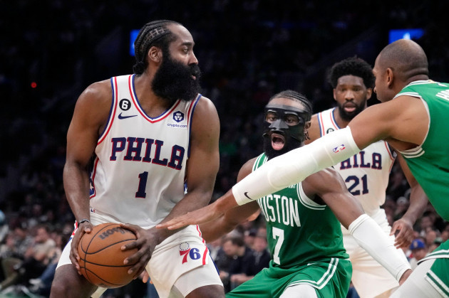 philadelphia-76ers-guard-james-harden-1-looks-to-pass-while-trapped-by-boston-celtics-guard-jaylen-brown-7-and-center-al-horford-during-the-second-half-of-game-2-in-the-nba-basketball-eastern-conf