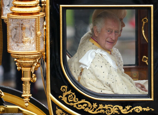 king-charles-iii-and-queen-camilla-are-carried-in-the-diamond-jubilee-state-coach-as-the-kings-procession-passes-along-the-mall-to-their-coronation-ceremony-london-picture-date-saturday-may-6-2023
