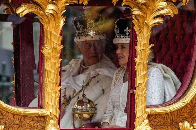 britains-king-charles-iii-left-and-queen-camilla-depart-westminster-abbey-after-the-coronation-ceremony-of-britains-king-charles-iii-in-london-saturday-may-6-2023-ap-photoalessandra-tarantino