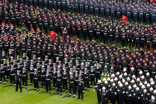 members-of-the-armed-forces-stand-in-formation-on-the-lawn-outside-buckingham-palace-after-the-coronation-of-britains-king-charles-iii-in-london-saturday-may-6-2023-ap-photopeter-dejong-pool