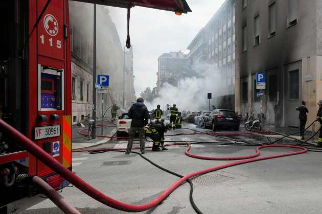firefighters-work-to-extinguish-a-fire-in-a-building-after-a-van-exploded-in-central-milan-northern-italy-thursday-may-11-2023-ap-photoluca-bruno