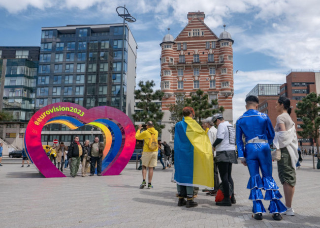 people-pose-for-photos-during-eurovision-week-at-pier-head-on-the-11th-may-2023-in-liverpool-england-credit-smp-news-alamy-live-news
