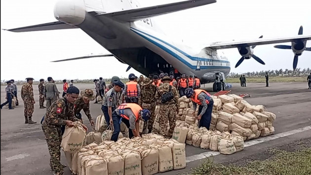in-this-photo-provided-by-myanmar-military-true-news-information-team-on-monday-may-15-2023-soldiers-and-polices-unload-relief-items-for-victims-at-airport-after-cyclone-mocha-in-sittwe-township-r