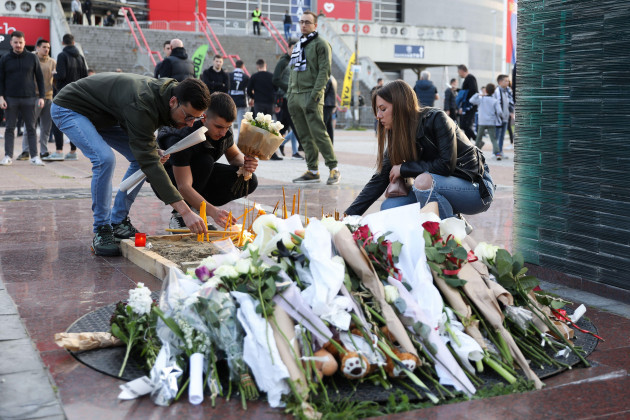belgrade-serbia-4-may-2023-people-leave-flowers-for-the-victims-killed-in-the-vladislav-ribnikar-elementary-school-prior-during-the-play-offs-game-4-20222023-turkish-airlines-euroleague-match