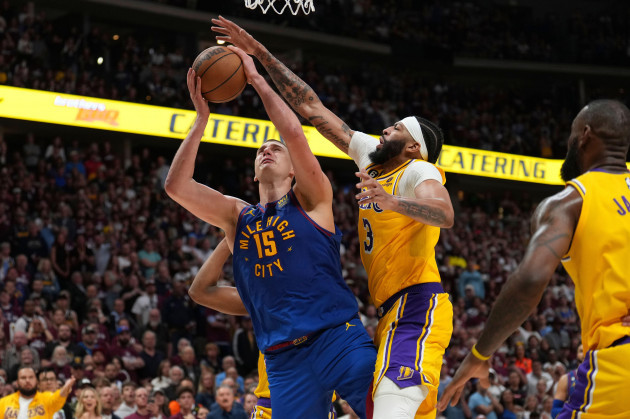 denver-nuggets-center-nikola-jokic-15-shoots-over-los-angeles-lakers-forward-anthony-davis-3-during-the-second-half-of-game-1-of-the-nba-basketball-western-conference-finals-series-tuesday-may-1