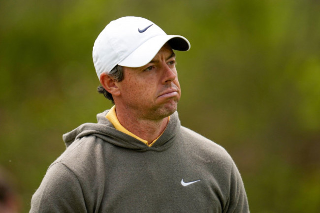 rory-mcilroy-of-northern-ireland-watches-his-tee-shot-on-the-fourth-hole-during-a-practice-around-for-the-pga-championship-golf-tournament-at-oak-hill-country-club-on-tuesday-may-16-2023-in-roche