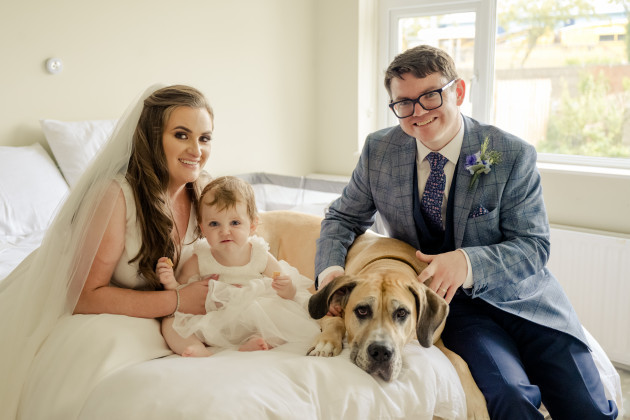 7. Brian Tyrrell and his wife Ciara on their wedding day, with daughter Anna and dog Nova, August 2021. Please credit PhotographicMemoryDOTie